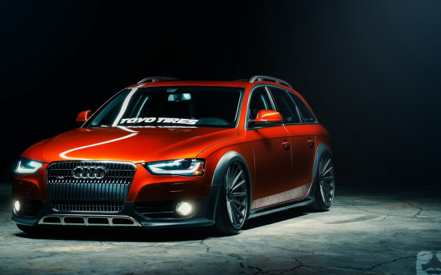 Red car white arrow headlights free wallpaper - medium preview image