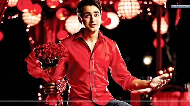 Man holding bouquet red shirt free wallpaper - medium preview image