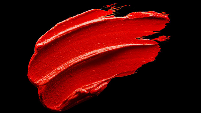 Red lipstick smudge black background free wallpaper - medium preview image