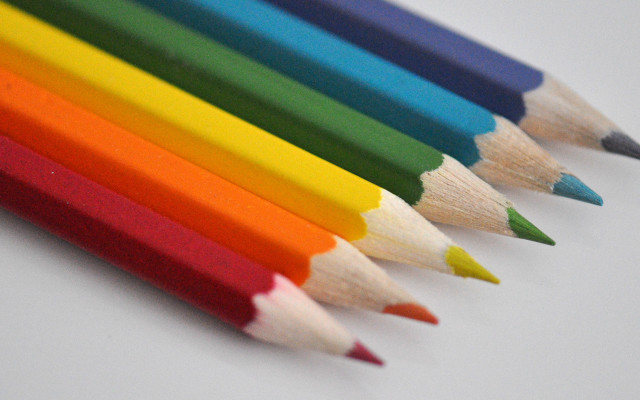 Colored pencils row white table free wallpaper - medium preview image