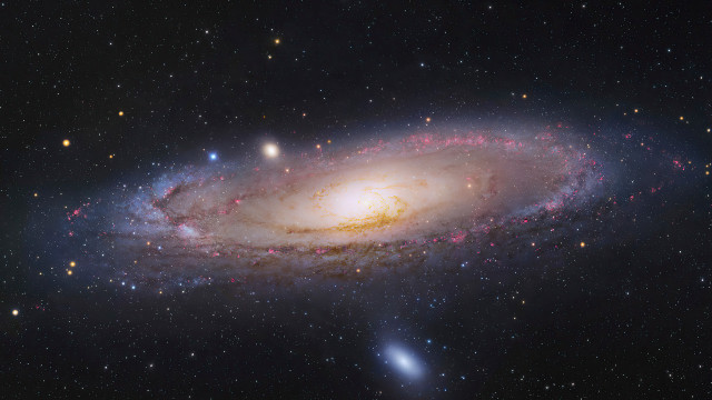 Spiral galaxy bright center stars #2 free wallpaper - medium preview image