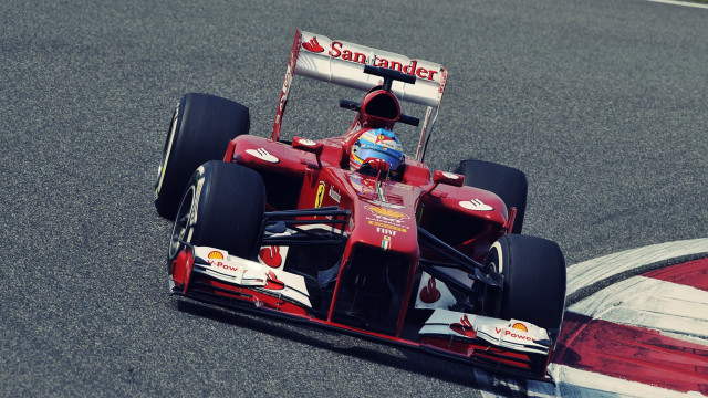 Man driving red race car #3 free wallpaper - medium preview image