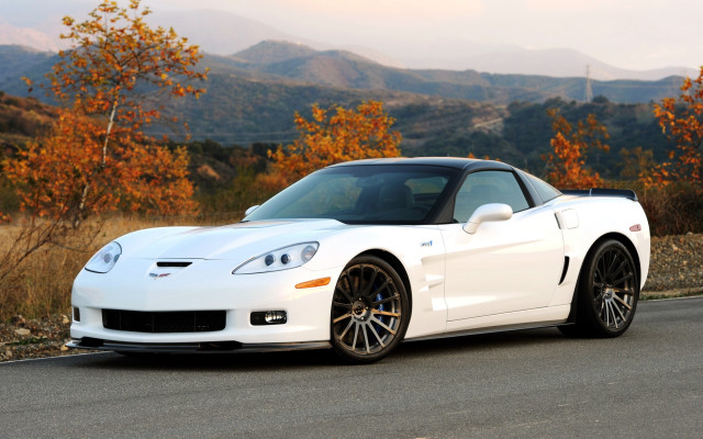 White sports car mountain road #2 free wallpaper - medium preview image