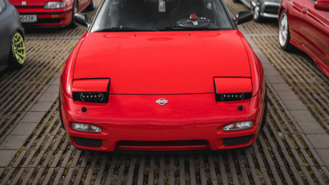 Red car parking lot truck #2 free wallpaper - medium preview image
