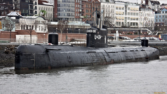Submarine city bridge man redjacket free wallpaper - medium preview image