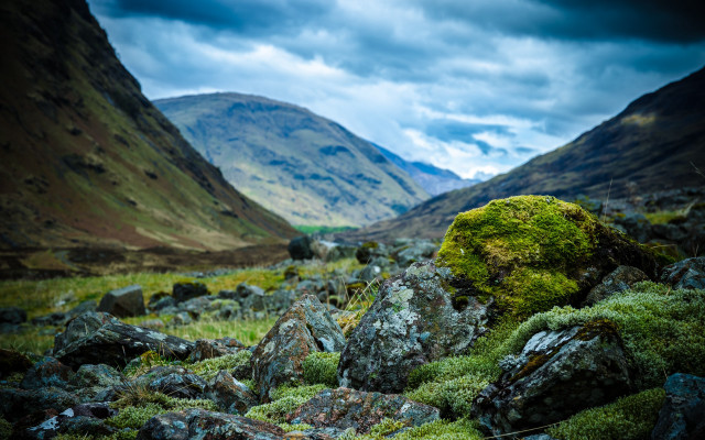 Mossy rock valley mountains clouds free wallpaper - medium preview image
