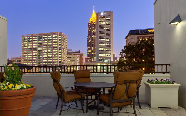 Balcony cityscape pottedplant table chairs free wallpaper - medium preview image