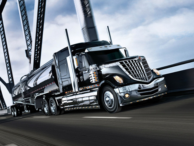 Semi truck highway bridge sky free wallpaper - medium preview image