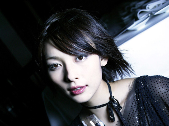 Woman black choker cell phone free wallpaper - medium preview image
