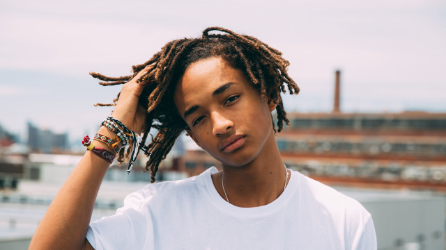 Man dreadlocks white shirt rooftop free wallpaper - medium preview image