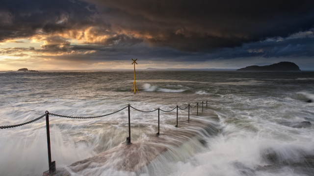 Storm ocean lighthouse ropes sunset free wallpaper - medium preview image