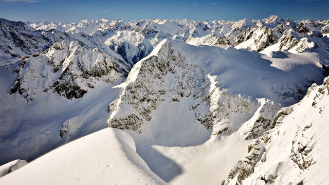 Mountain range plane view skier free wallpaper - medium preview image