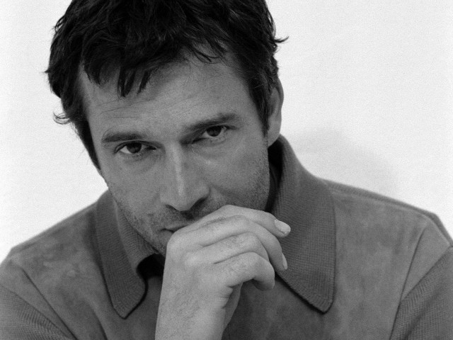 Man watch serious look camera #2 free wallpaper - medium preview image