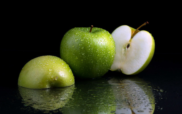 Green apple slice half reflective free wallpaper - medium preview image