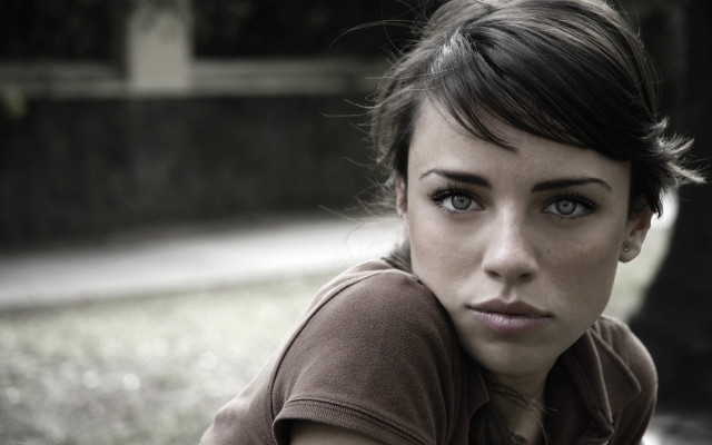 Serious woman park bench hyperrealism free wallpaper - medium preview image