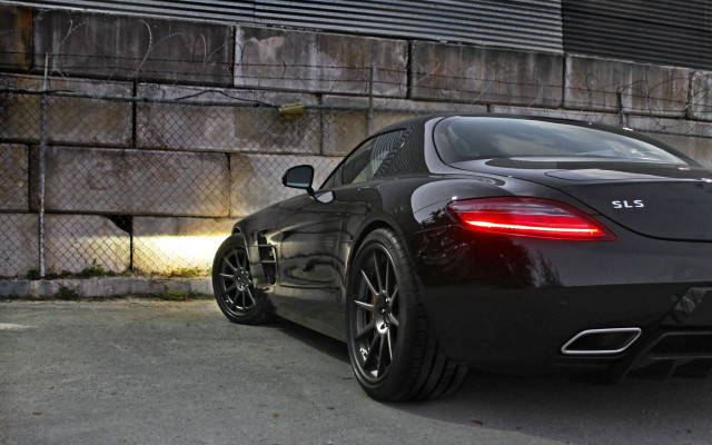 Black sports car brick wall #5 free wallpaper - medium preview image