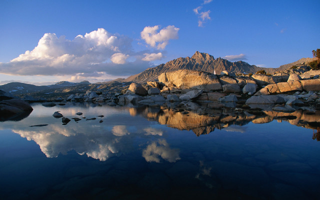 Mountain lake rocks clouds reflection free wallpaper - medium preview image