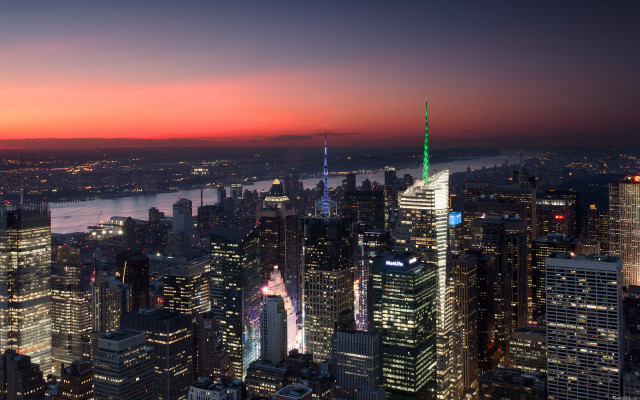 Cityscape night redsky river greenspire free wallpaper for desktop - medium preview image