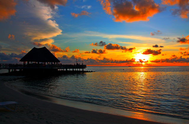 Sunset beach hut water people free wallpaper - medium preview image