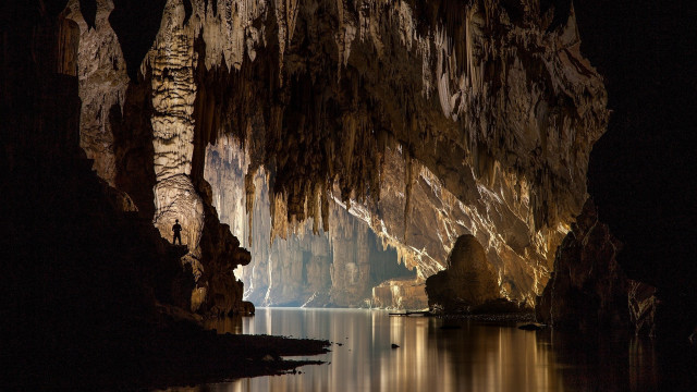 Cave lake boat night lights free wallpaper - medium preview image
