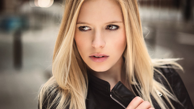 Blonde woman black jacket bokeh free wallpaper - medium preview image