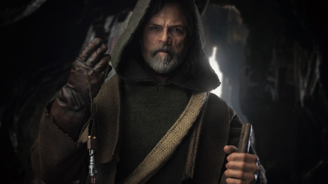 Cave hooded man knife flashlight free wallpaper - medium preview image