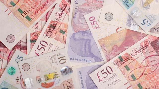 Currency pile cellphone and girls free wallpaper - medium preview image