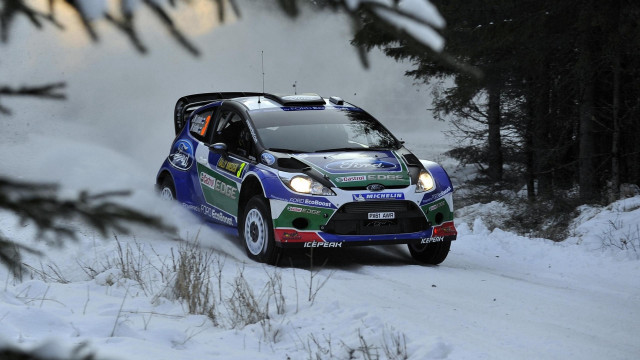 Rally car snow forest motion free wallpaper - medium preview image
