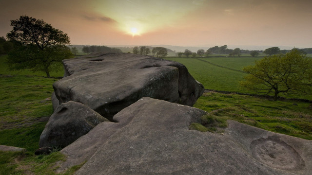 Rock formation grassy field sunset #2 free wallpaper - medium preview image