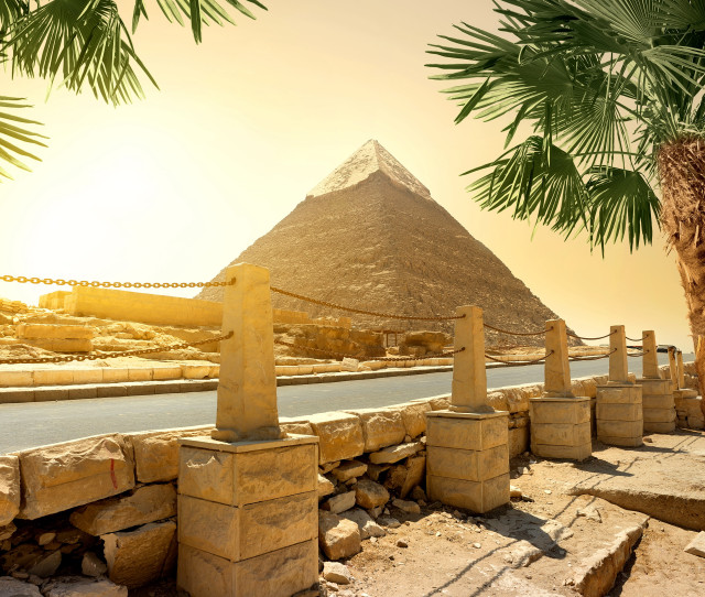 Stone wall pyramid palm tree free wallpaper - medium preview image