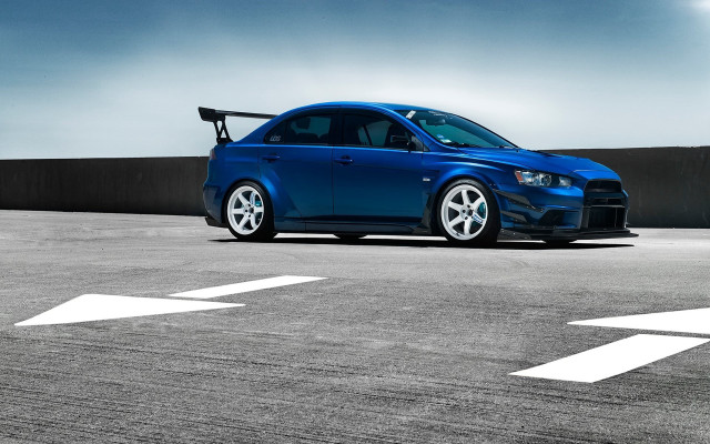 Blue car parking lot white free wallpaper - medium preview image