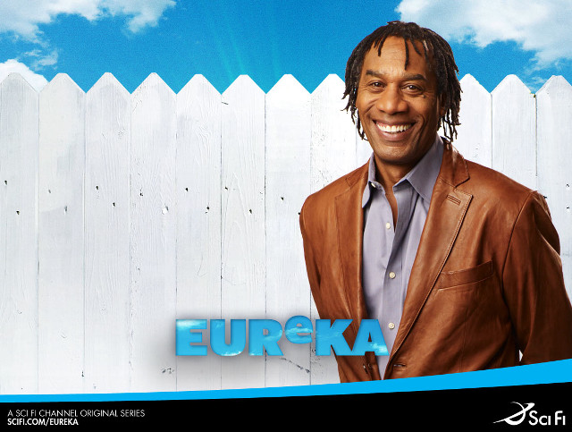 Man brownjacket blue sky fence free wallpaper - medium preview image