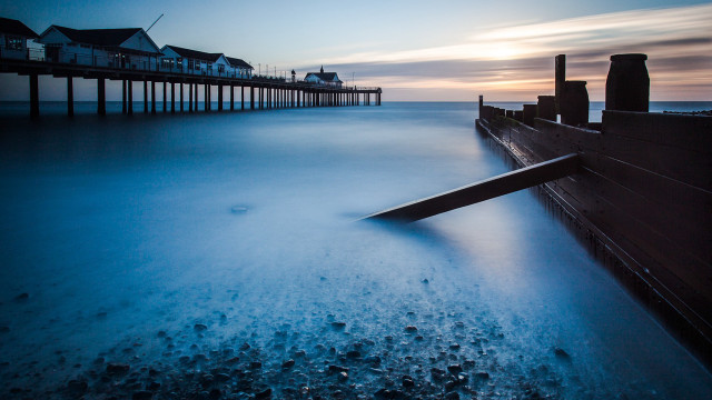 Long pier houses ocean sky free wallpaper - medium preview image