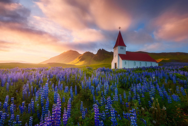 Church blueflowers sunset mountains puzzle free wallpaper - medium preview image