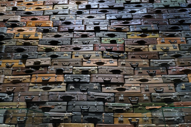 Luggage pile liminal space postminimalism free wallpaper - medium preview image