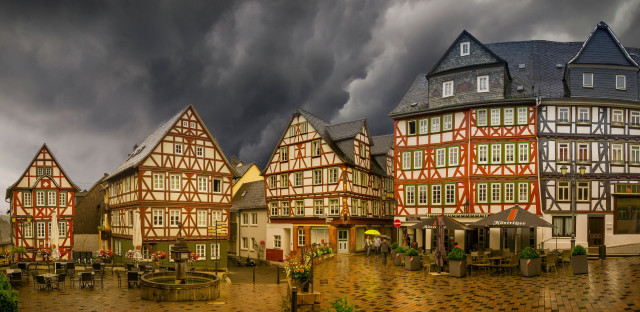 Stormy cityscape architecture rain clouds free wallpaper - medium preview image