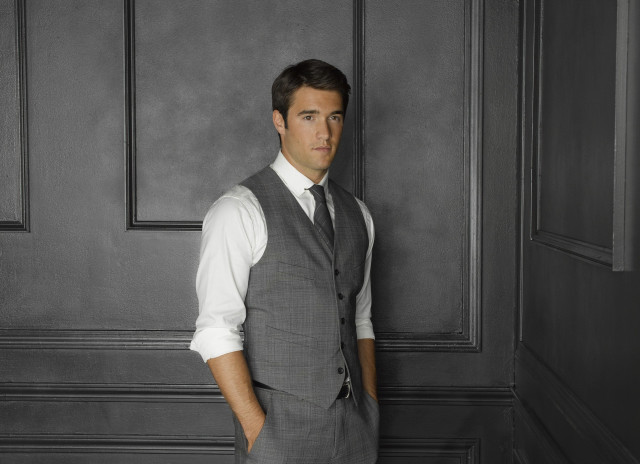 Man suit tie standing room free wallpaper - medium preview image