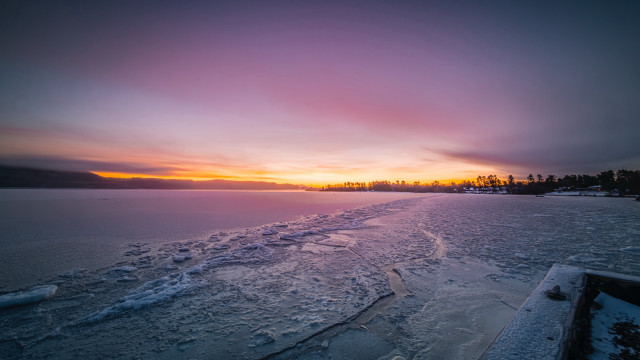 Snowy beach sunset ocean city free wallpaper - medium preview image