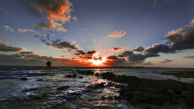 Sunset ocean lighthouse clouds beach free wallpaper - medium preview image