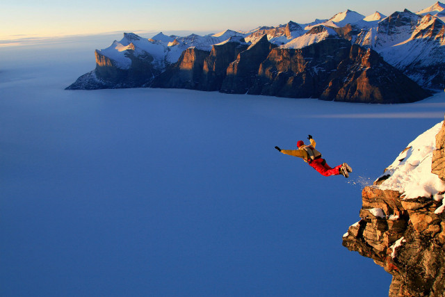 Man jumping cliff snowboard mountain free wallpaper - medium preview image