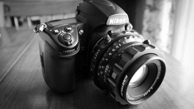 Camera table lens flash photorealism free wallpaper - medium preview image