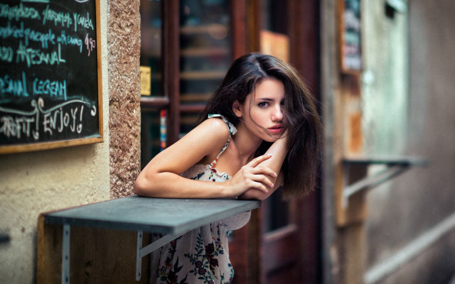 Woman leaning table chalkboard writing free wallpaper - medium preview image