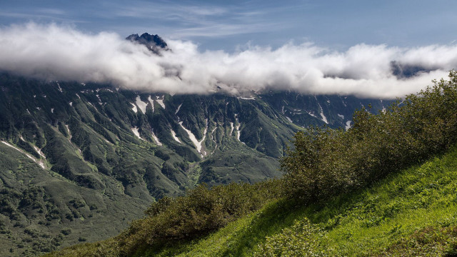 Mountain hillside clouds sunset ocean free wallpaper - medium preview image