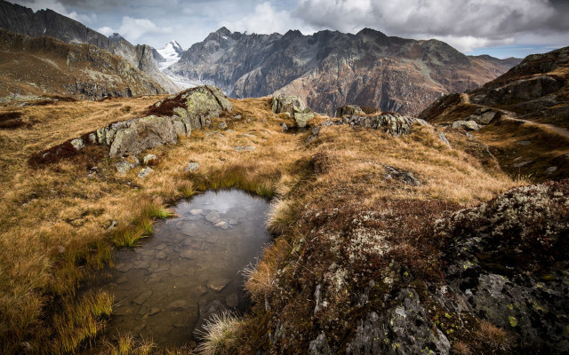 Small stream grassy field snowy free wallpaper - medium preview image