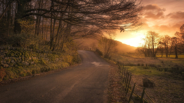 Sunset road fence trees mountains free wallpaper - medium preview image