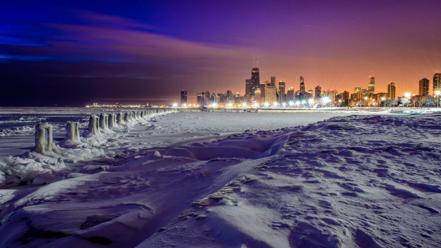 Snowy beach city skyline night free wallpaper - medium preview image
