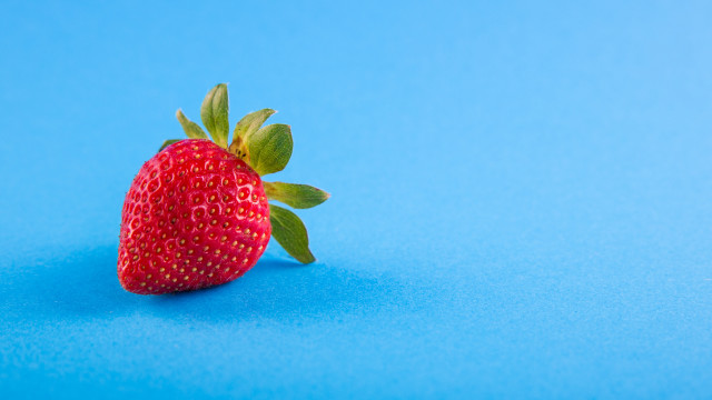 Strawberry greenleaf bluebackground shadow minimalist free wallpaper - medium preview image
