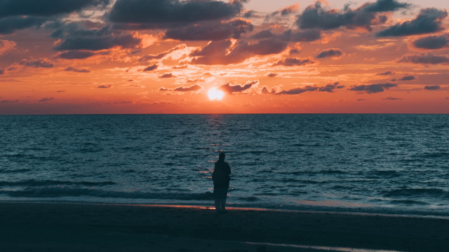 Beach sunset person clouds dock free wallpaper - medium preview image