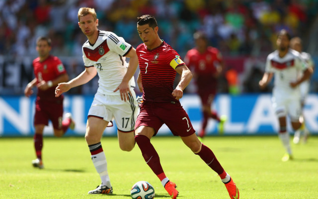 Soccer players crowd blurry bokeh free wallpaper - medium preview image