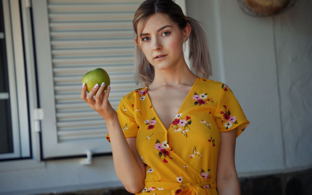 Yellow dress green apple serious free wallpaper - medium preview image